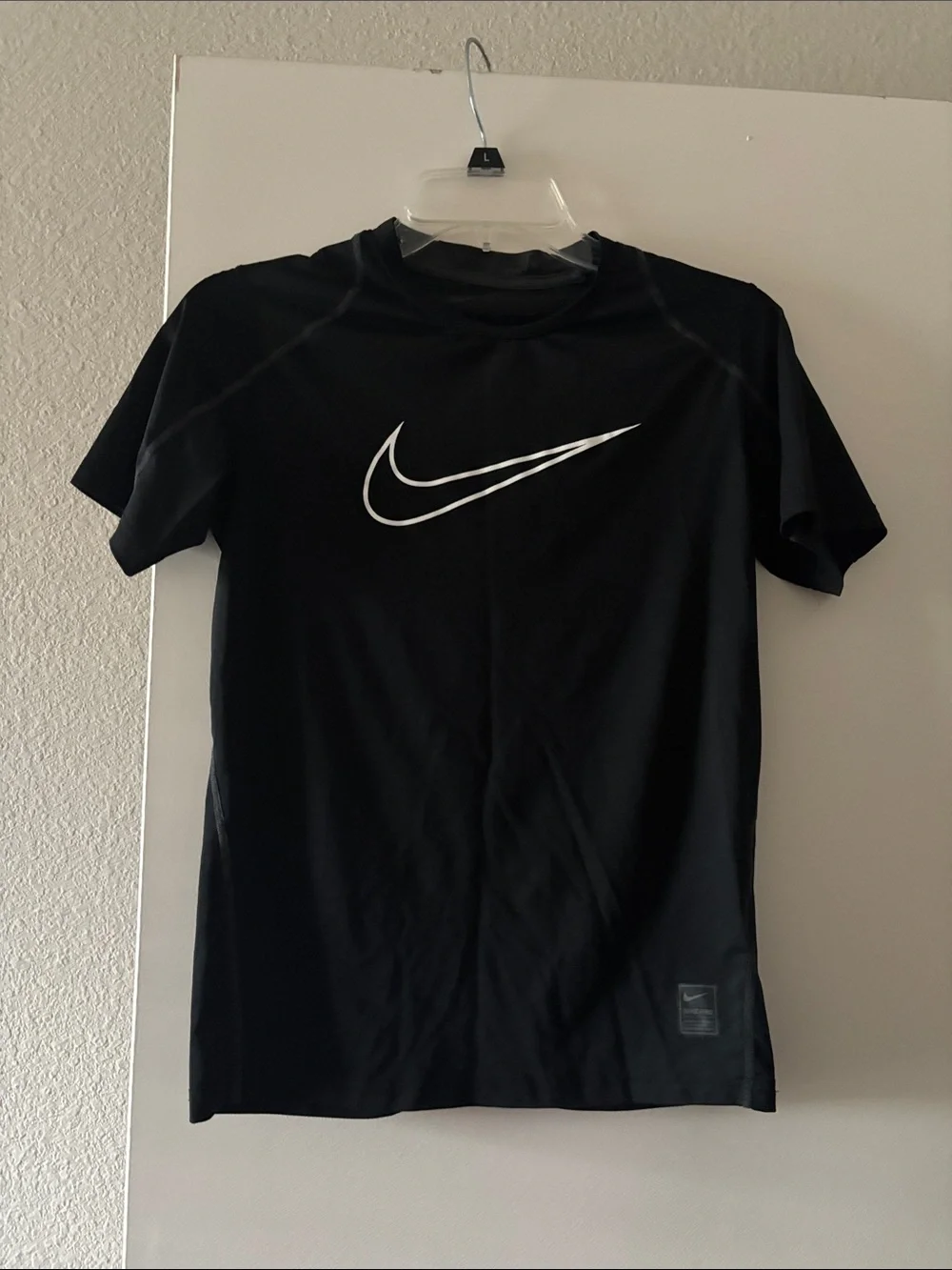 Nike Black Short-Sleeve Athletic Tee with White Swoosh